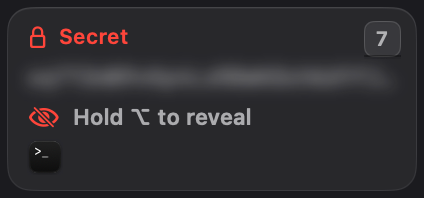 A Secret tile, blurred, with Hold Option to reveal